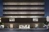 Herzog & de Meuron's RCA Battersea campus project - Parkgate Road view at night